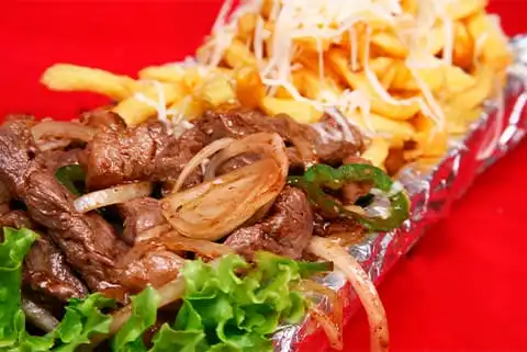 Contra filé na telha acompanhado de fritas